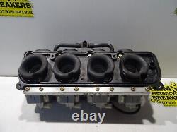 Kawasaki ZX6R ZX 6R Carbs Carburettors translates to: Kawasaki ZX6R ZX 6R Carburateurs Carburateurs in French.